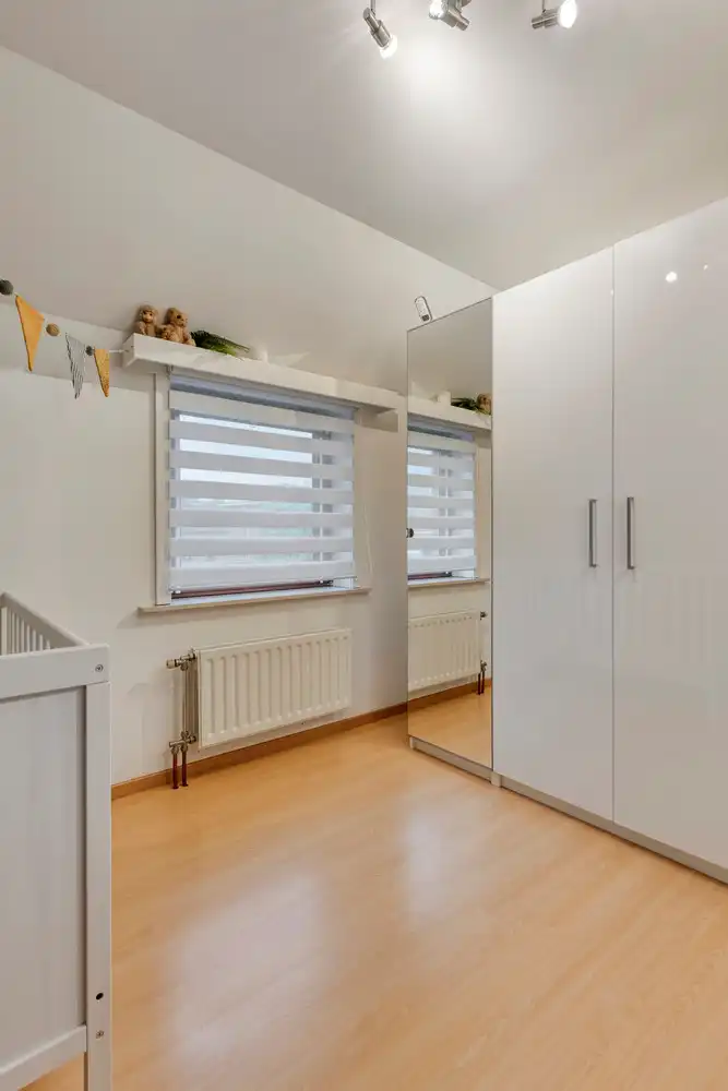 Instapklare split-level woning in de gegeerde wijk Rietschoorvelden te Merksem! foto 21