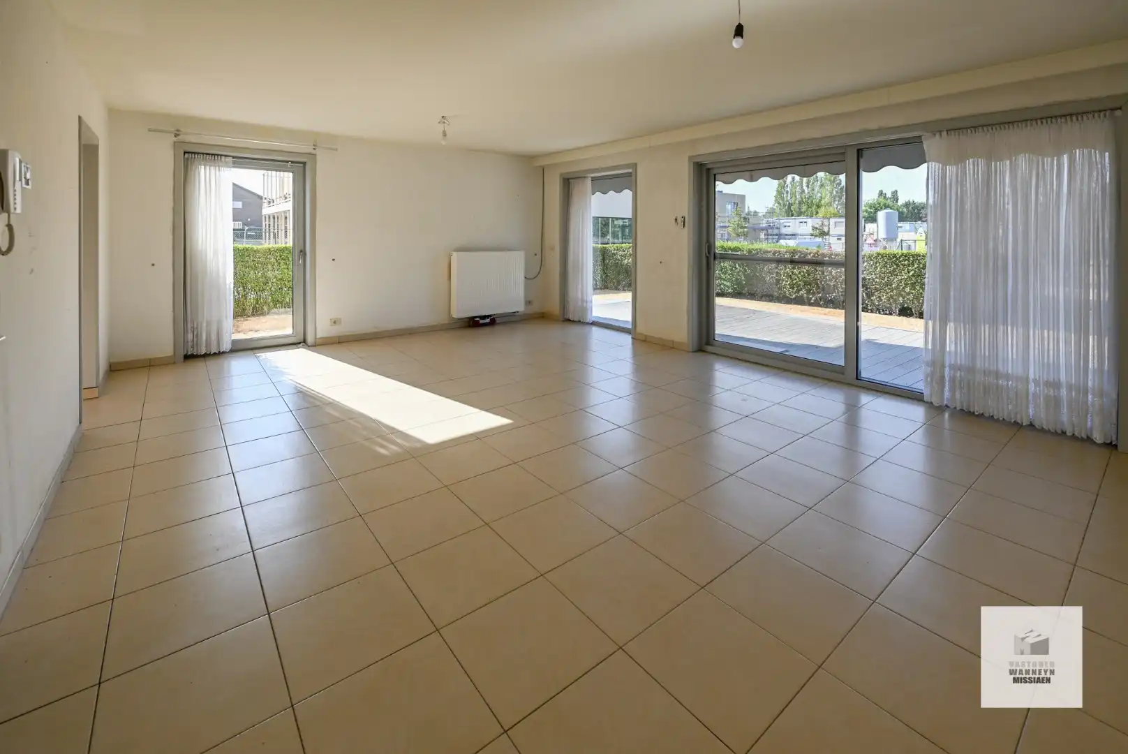 Ruim gelijkvloers appartement met 2 slpk en zonnige tuin/terras foto 2