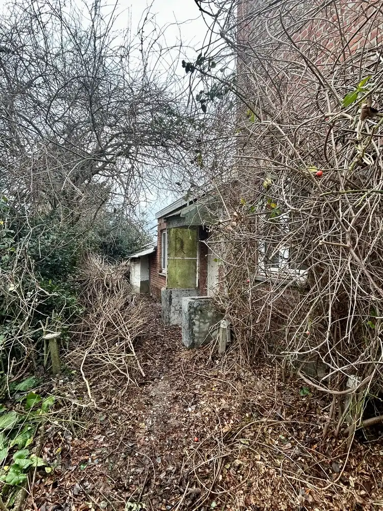 Te renoveren halfopen bebouwing met tuin - groot potentieel foto 17