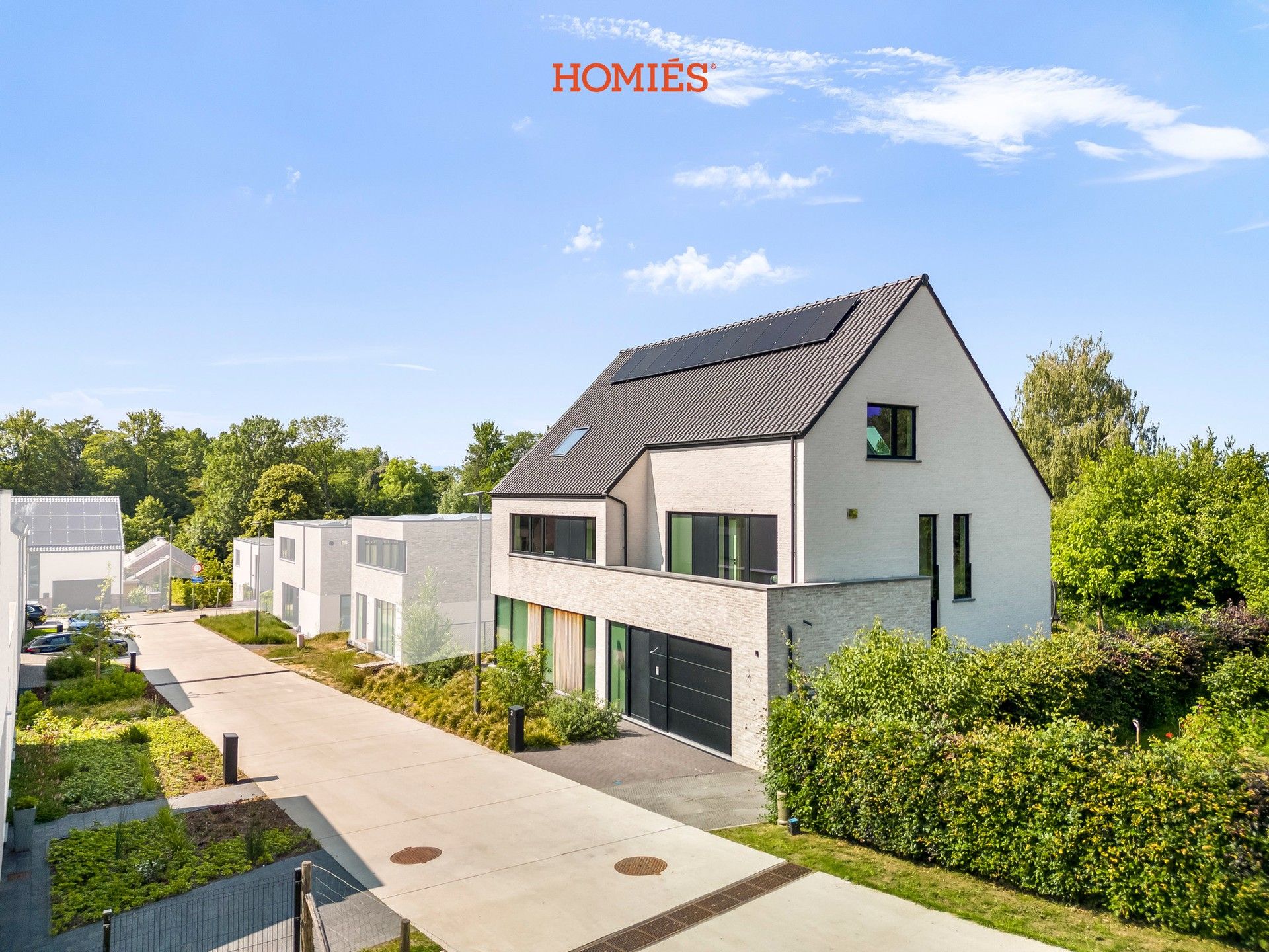 Eigentijdse nieuwbouwvilla met topafwerking in Bierbeek foto {{pictureIndex}}