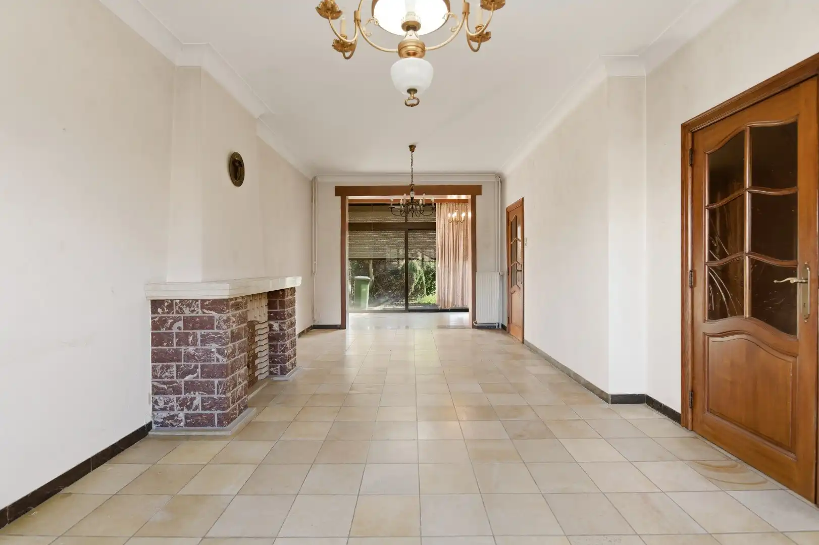 Op te frissen rijwoning met 2 slaapkamers en ruime tuin in Tienen foto 6