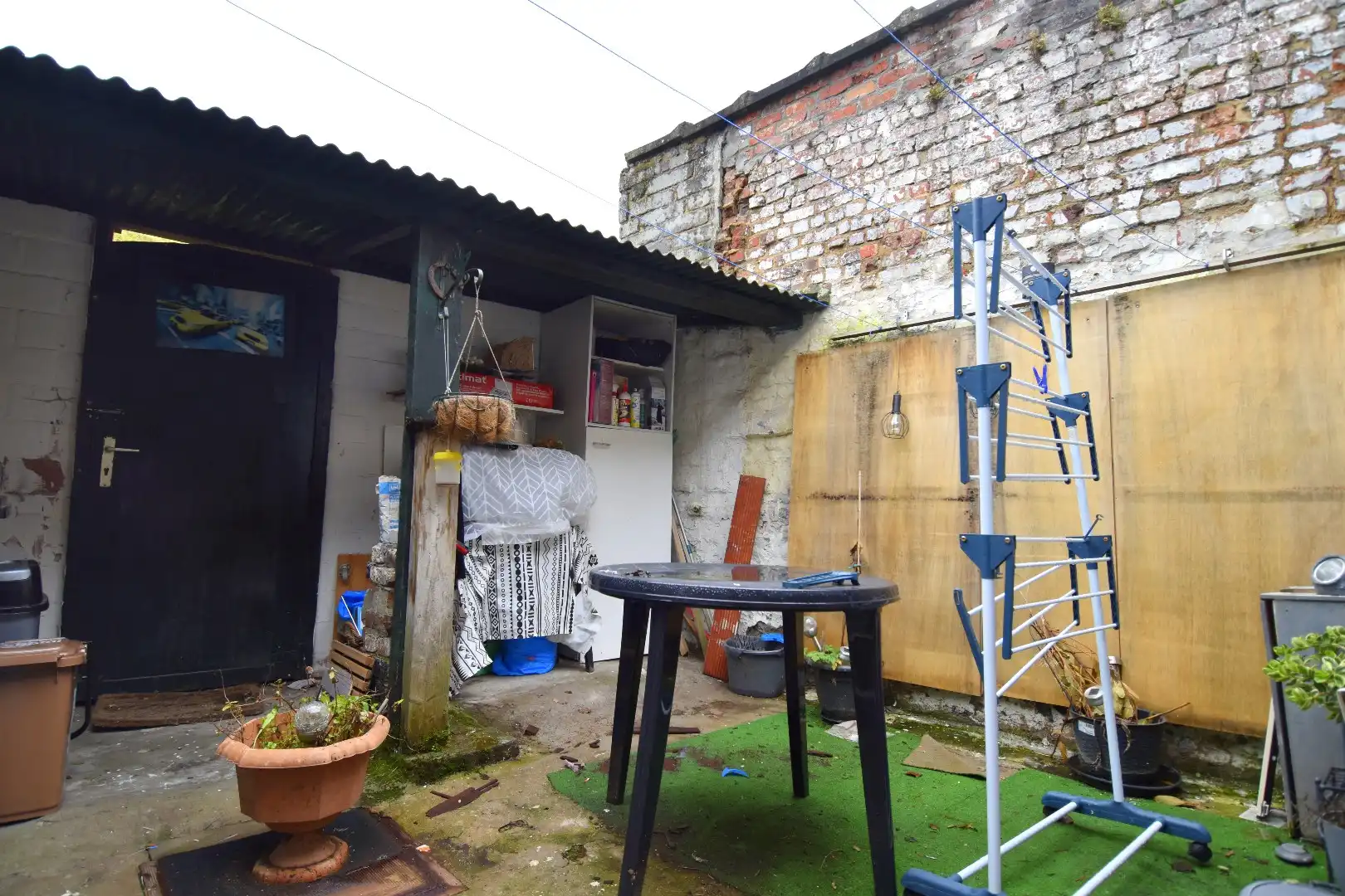 Te renoveren woning met 2 slaapkamers (4 mogelijk!) en tuin te Marke foto 11