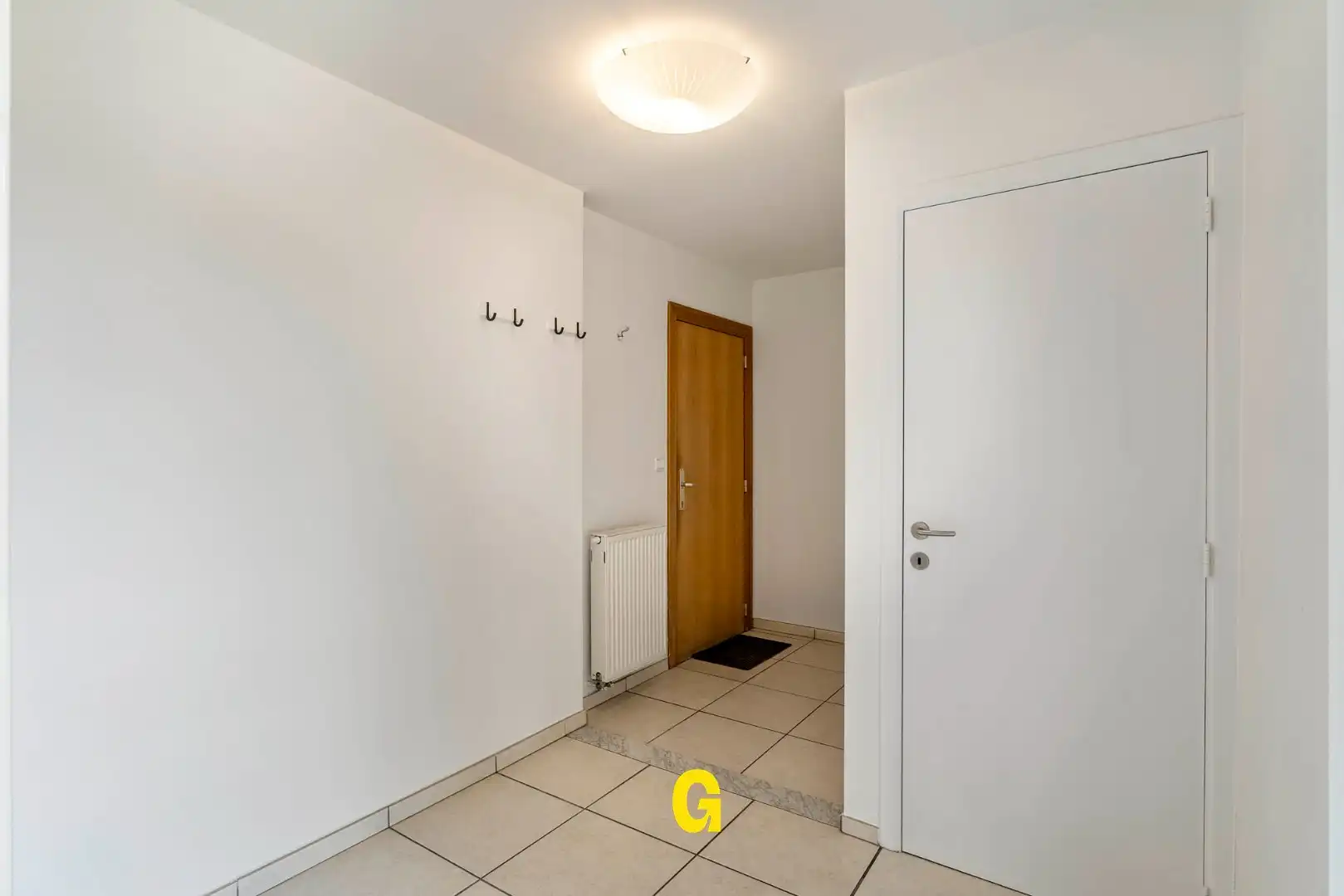 *** VERKOCHT *** Aangenaam duplexappartement met drie slaapkamers, autostandplaats en kelderberging foto 4