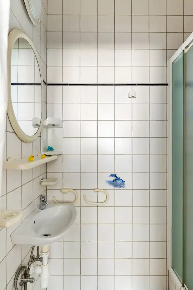 Vrijstaande, te renoveren woning met 3 à 4 slpk., garage en zuid-tuin foto 14