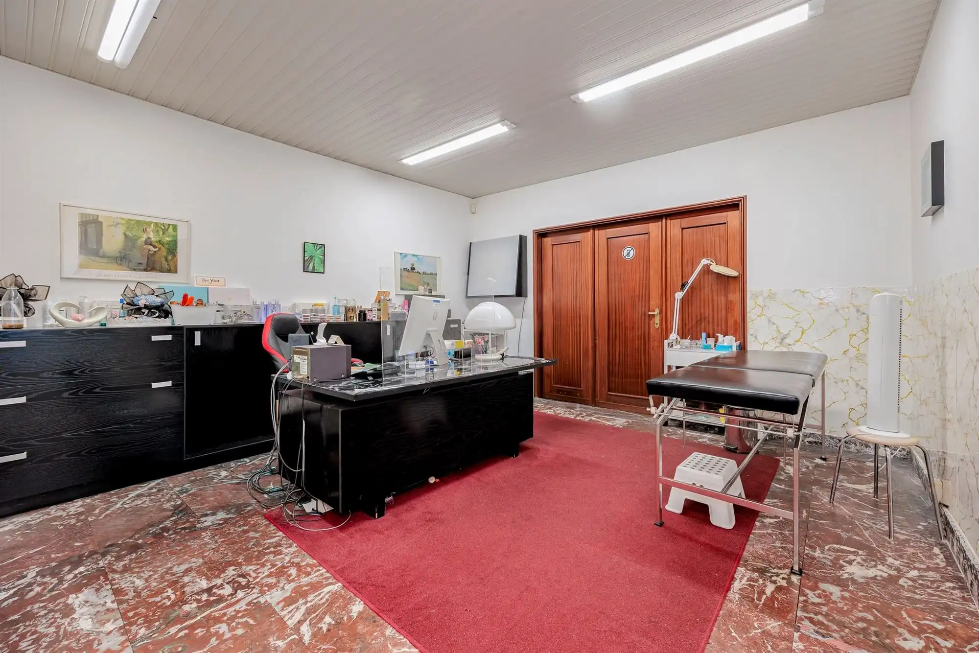 Ruime woning met veelzijdige praktijkruimtes foto 7