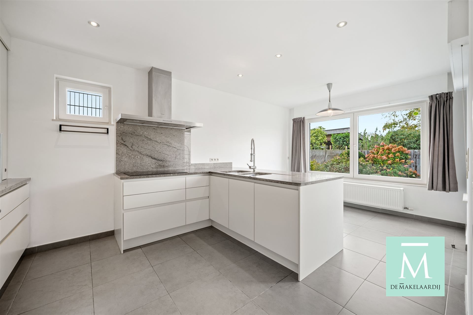 Prachtige halfopen woning aan de Vaart op de grens Zemst en Mechelen! foto 3