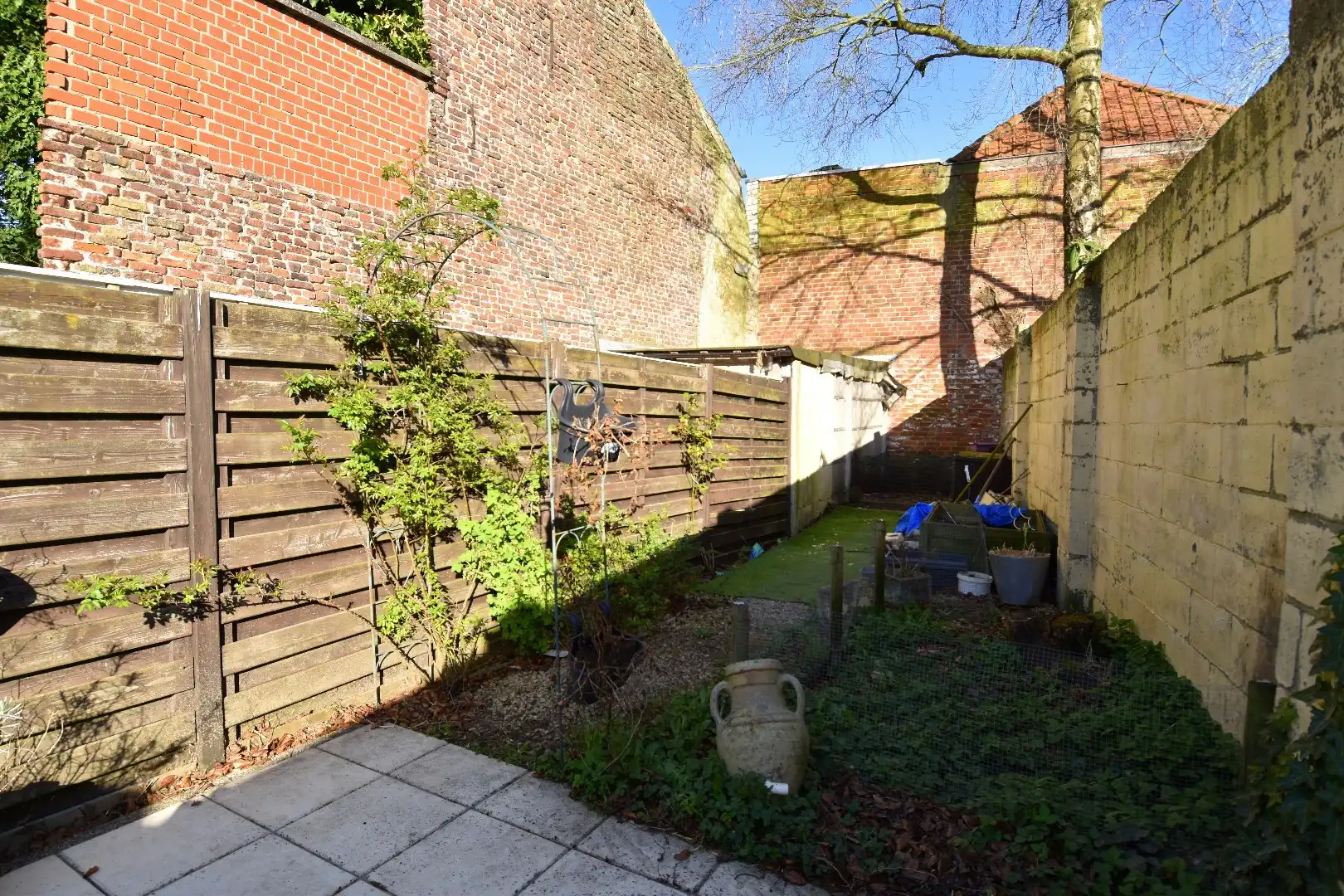 Toffe rijwoning met 2 slaapkamers en stadstuin te koop nabij Kortrijk-centrum foto 9