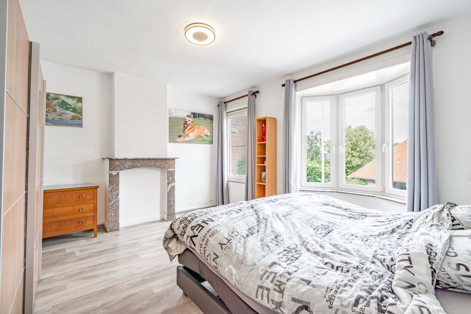 Instapklare woning met zonnepanelen en uitweg via achterliggende ruime garage! foto 9
