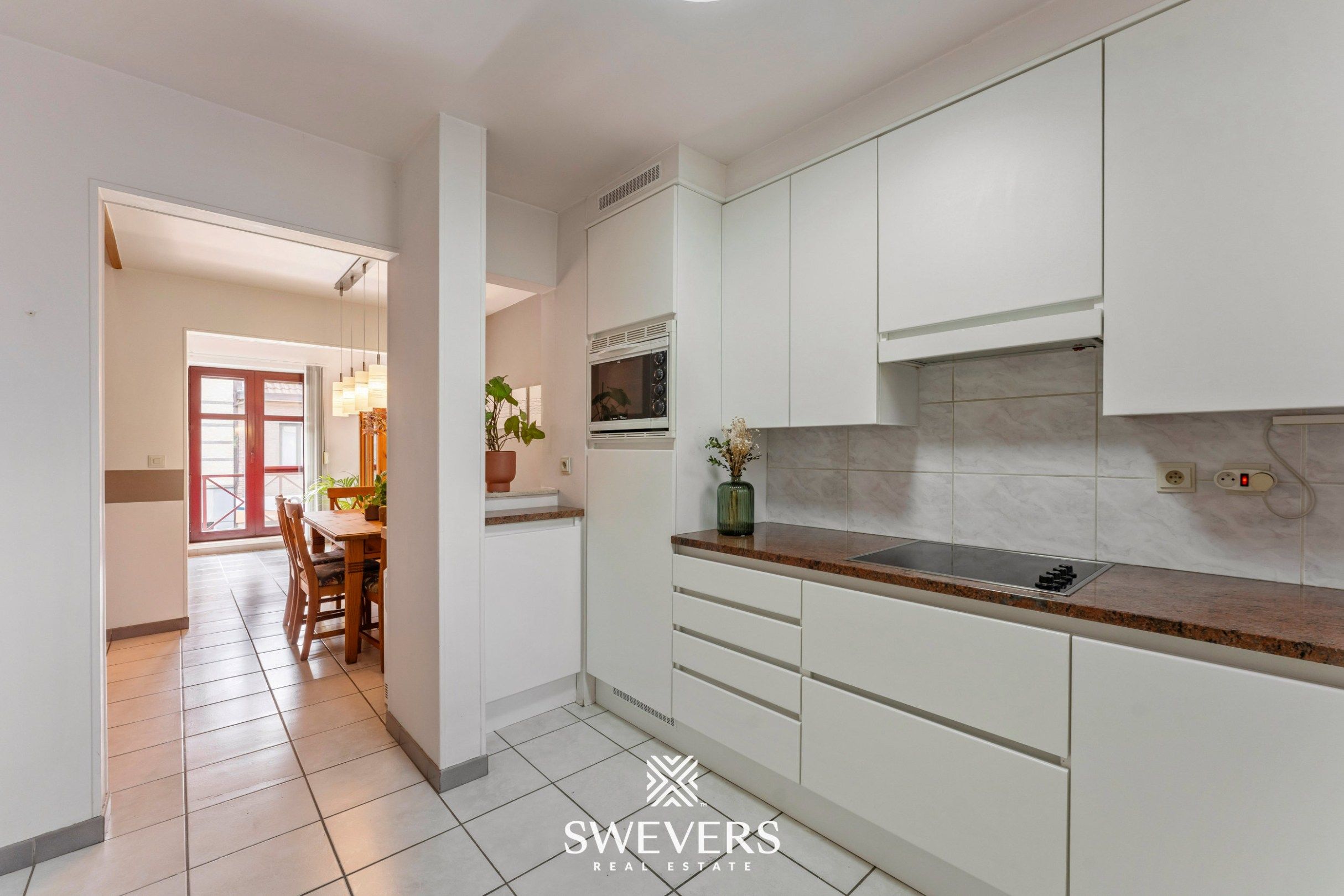 Instapklaar en lichtrijk duplexappartement in centrum Herk-de-Stad foto 16
