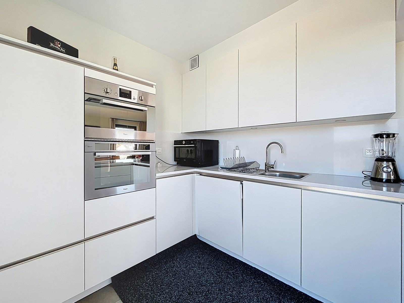 Instapklaar ruim app mét autostaanplaats en terras foto 9