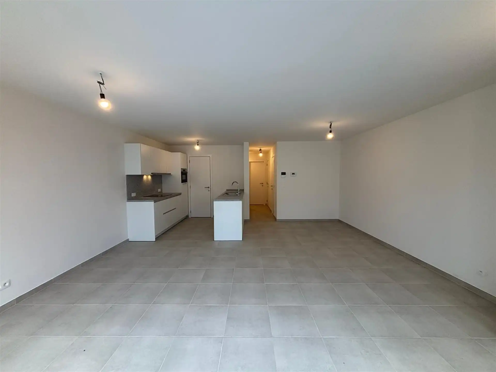 Modern gelijkvloers appartement met private tuin en ruime terrassen in Asse! foto 3