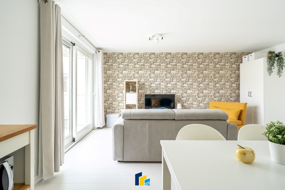 Stijlvolle studio met balkon in rustige setting foto 3