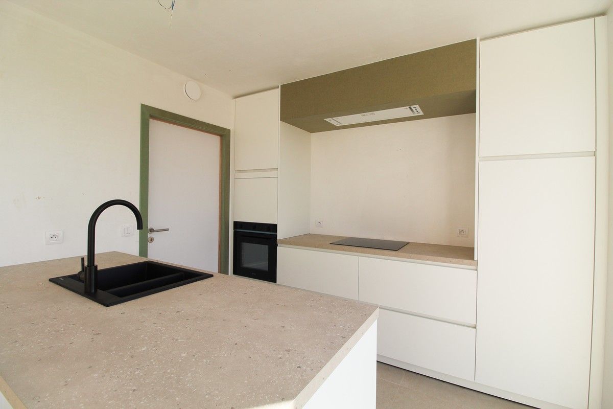 Halfopen nieuwbouwwoning met garage Roeselare foto 5