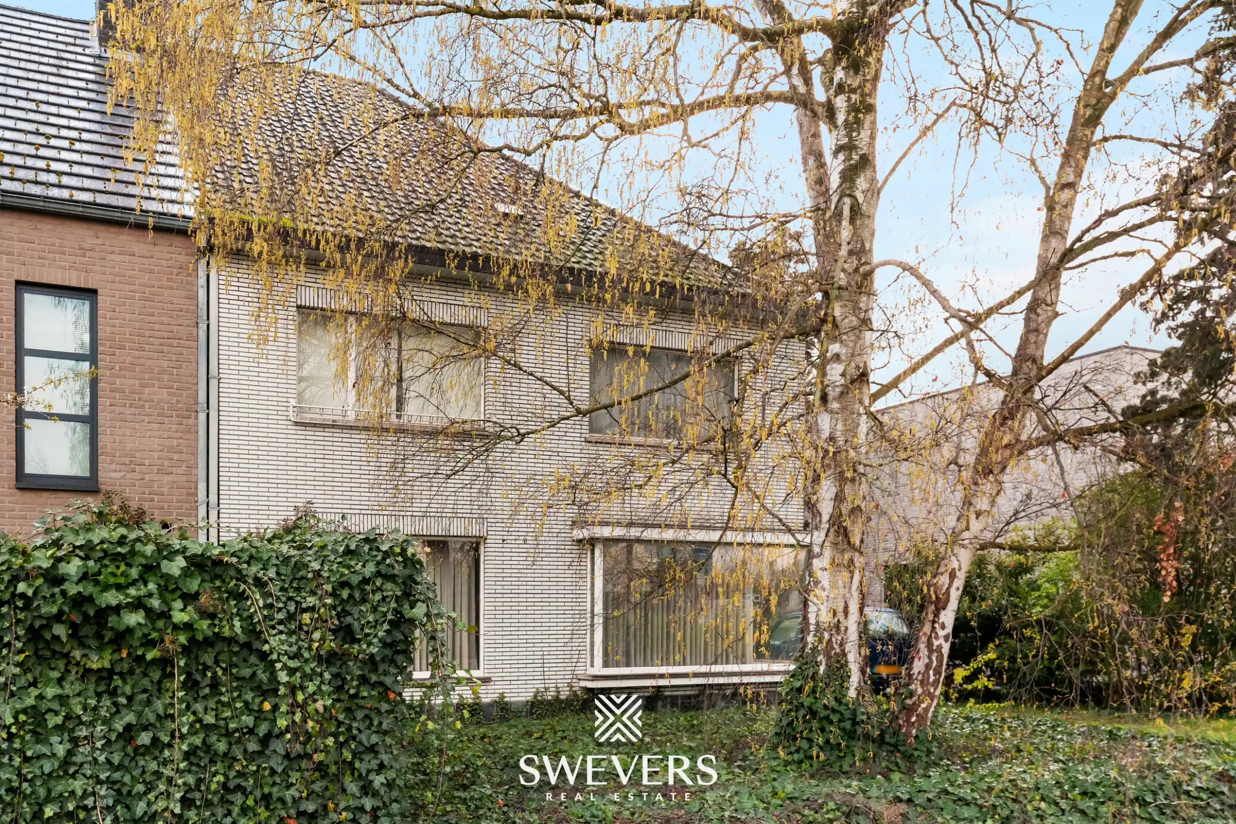 Ruime halfopen bebouwing met 4 slaapkamers en veel renovatiepotentieel op topligging in Hasselt foto 29