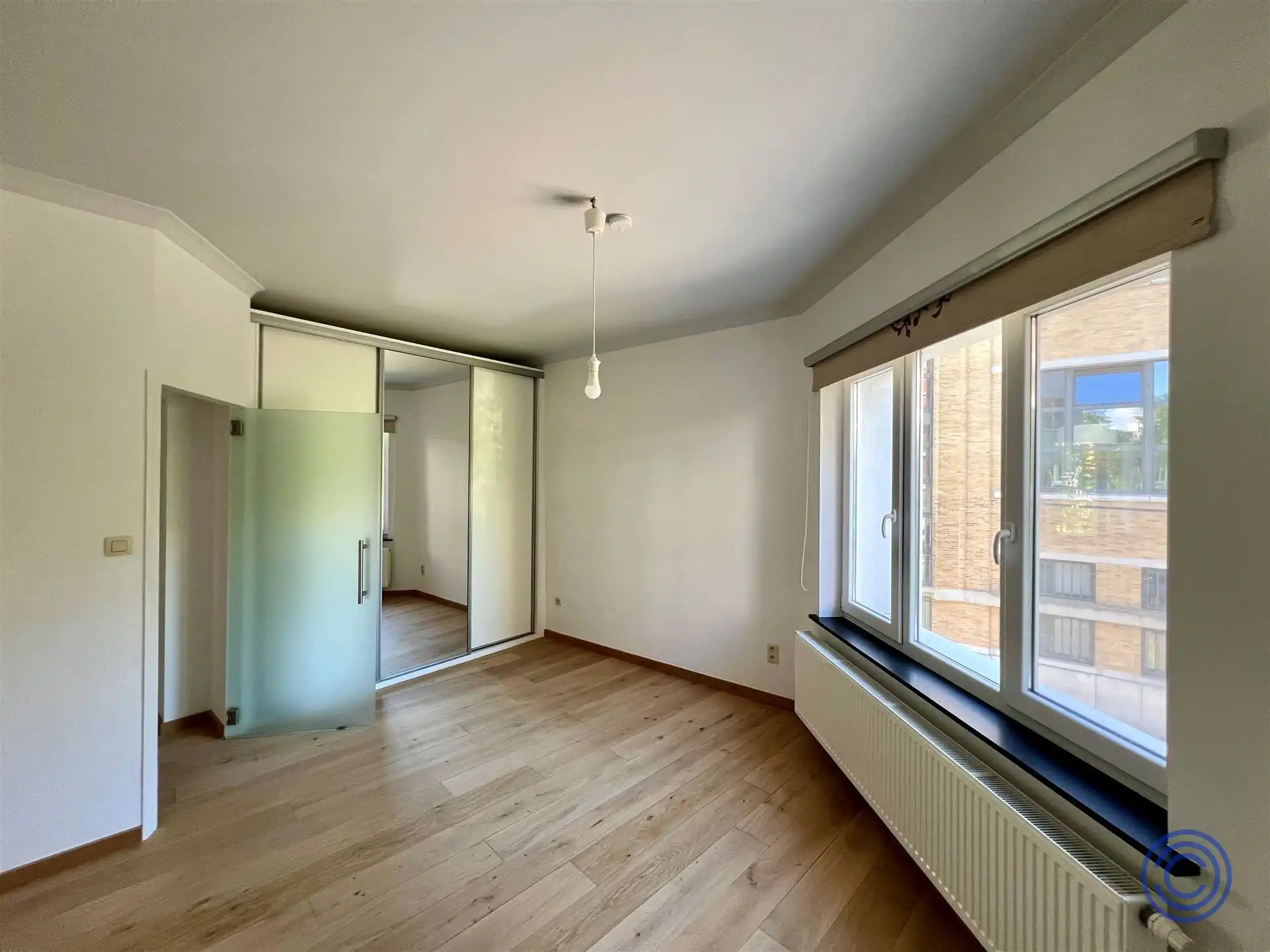 Ruim 2-slpk appartement op toplocatie + garage! foto 7