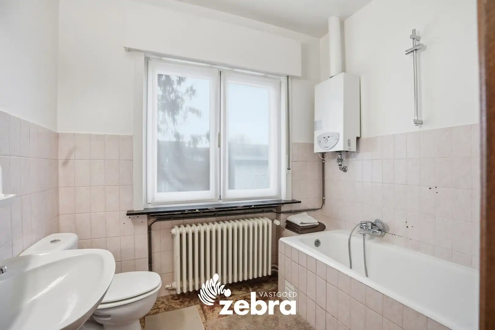 Energiezuinige woning met drie slaapkamers in centrum Tielt! foto 14