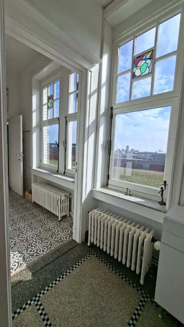 Uniek en lichtrijk appartement in standingvolle residentie op topligging! foto 9
