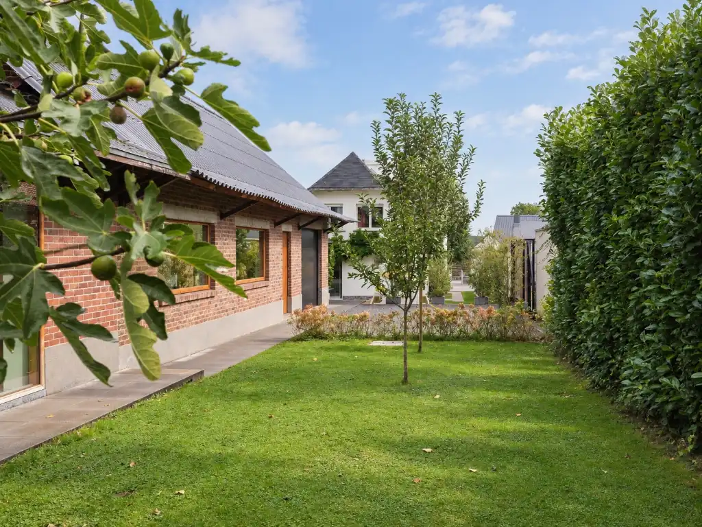 Karaktervolle woning met polyvalente achterbouw en aangename tuin in Westrem. foto 28