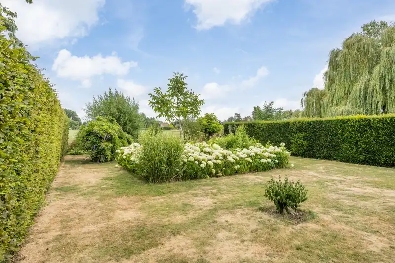 Luxueuze, halfopen bebouwing met 3 slaapkamers, inpandige garage en een prachtige tuin foto 35
