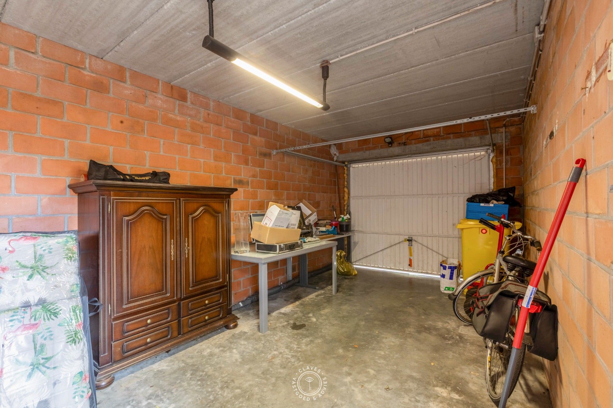 Lichtrijk gelijkvloers appartement met 3 slaapkamers, tuin en garage foto 14