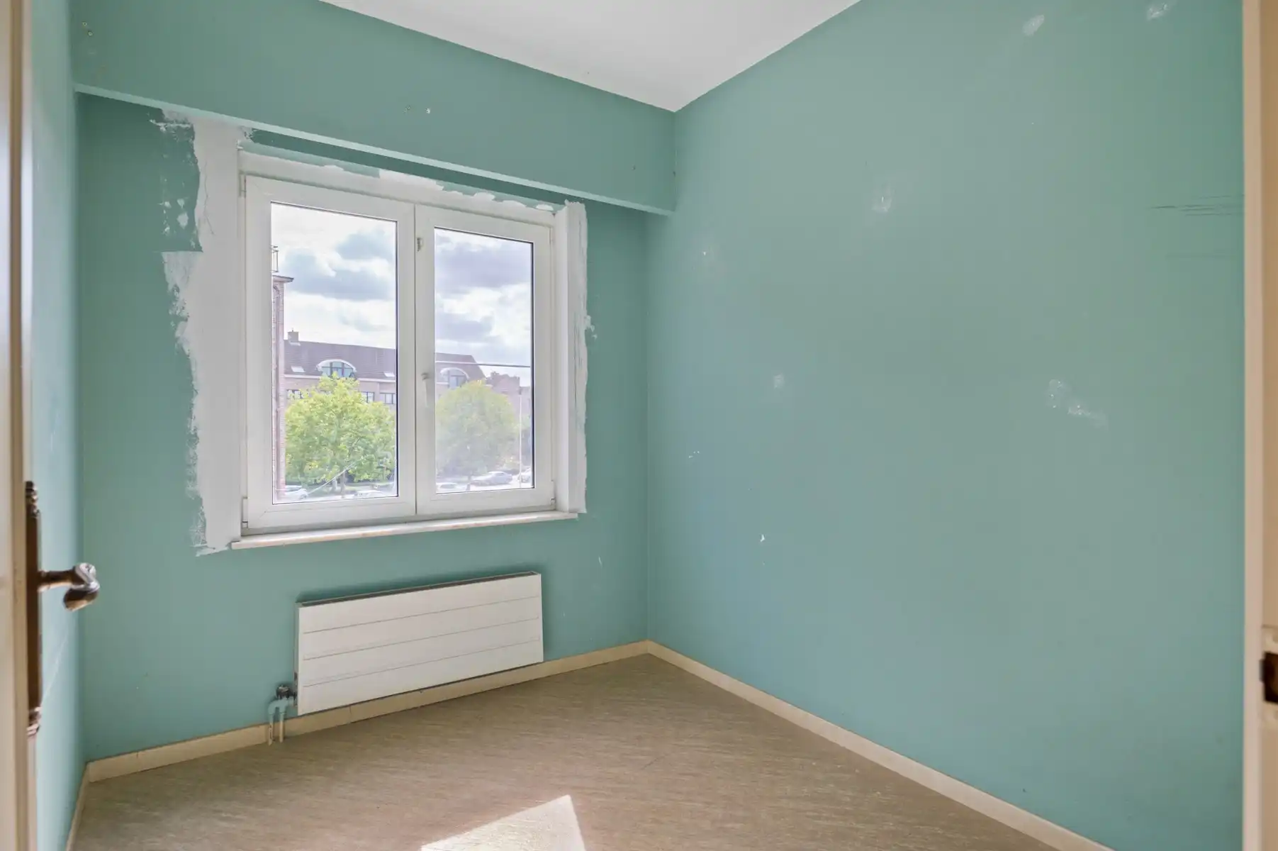 Goed gelegen 3-slaapkamerappartement met garage foto 14