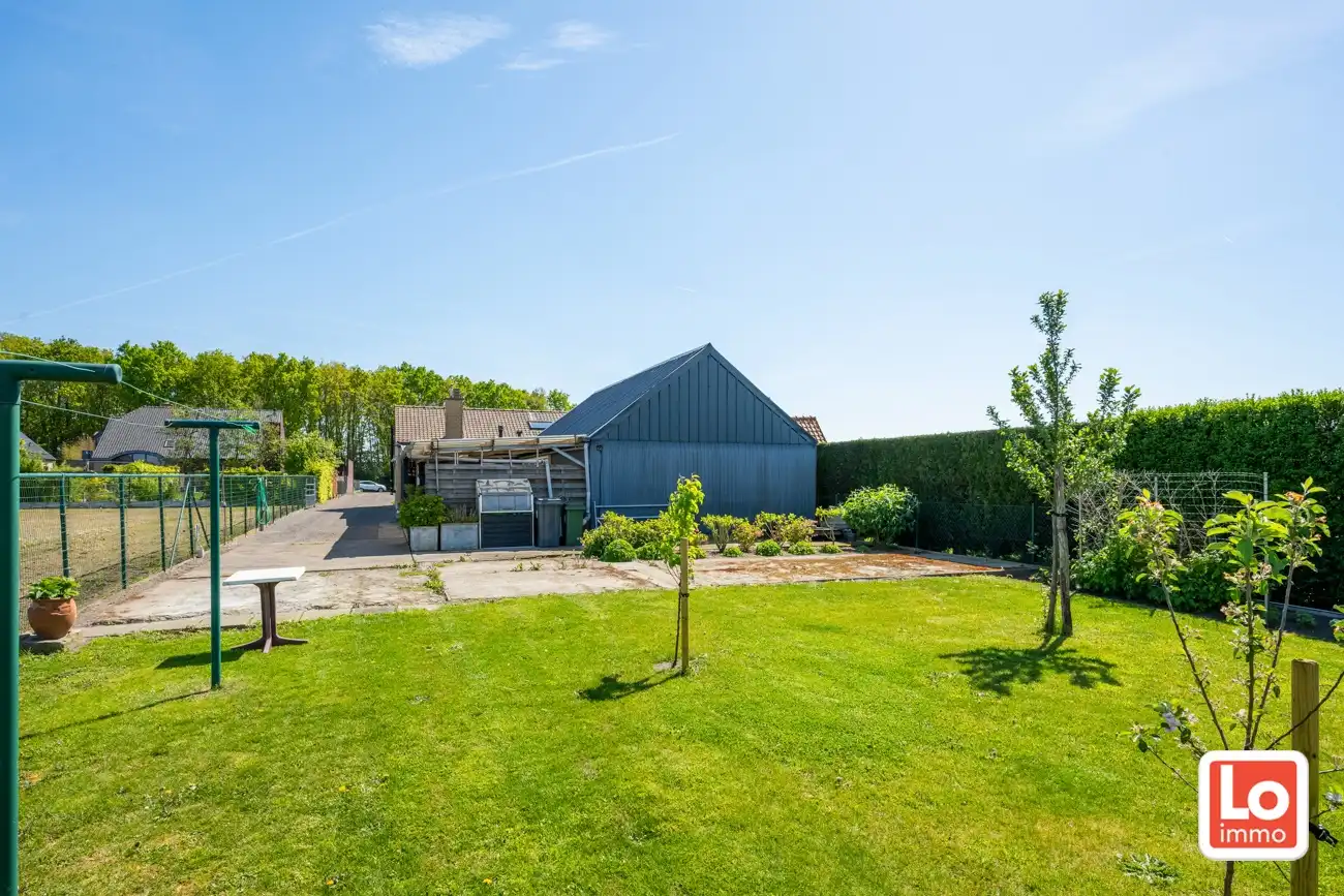 Landelijk gelegen half open woning met ruim bijgebouw (ca. 65m) en grote tuin met open zicht tussen Hijfte en Lochristi. foto 29