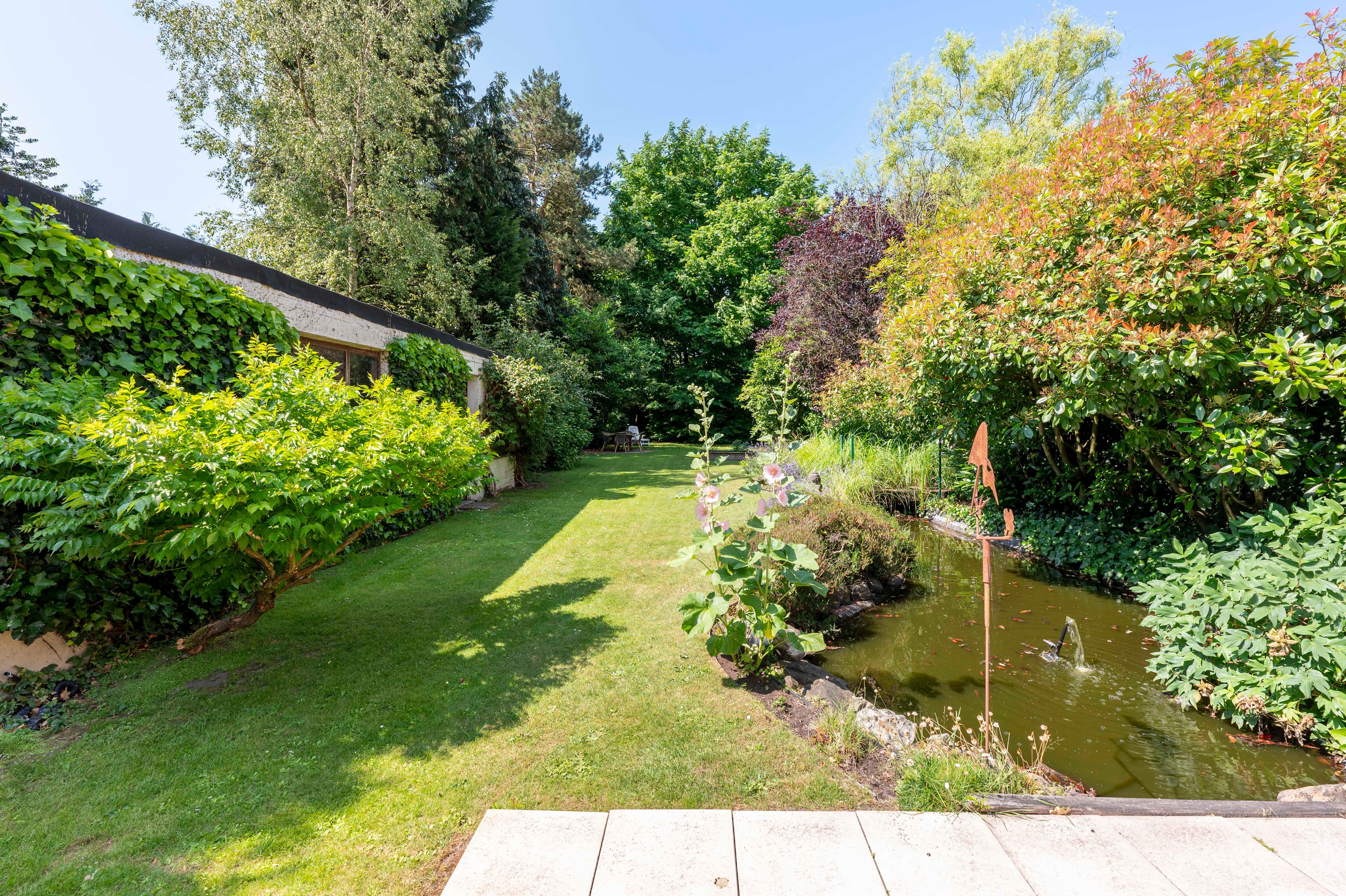 Gezinswoning met grote tuin in kindvriendelijke wijk Driehoek te Brasschaat! foto 28
