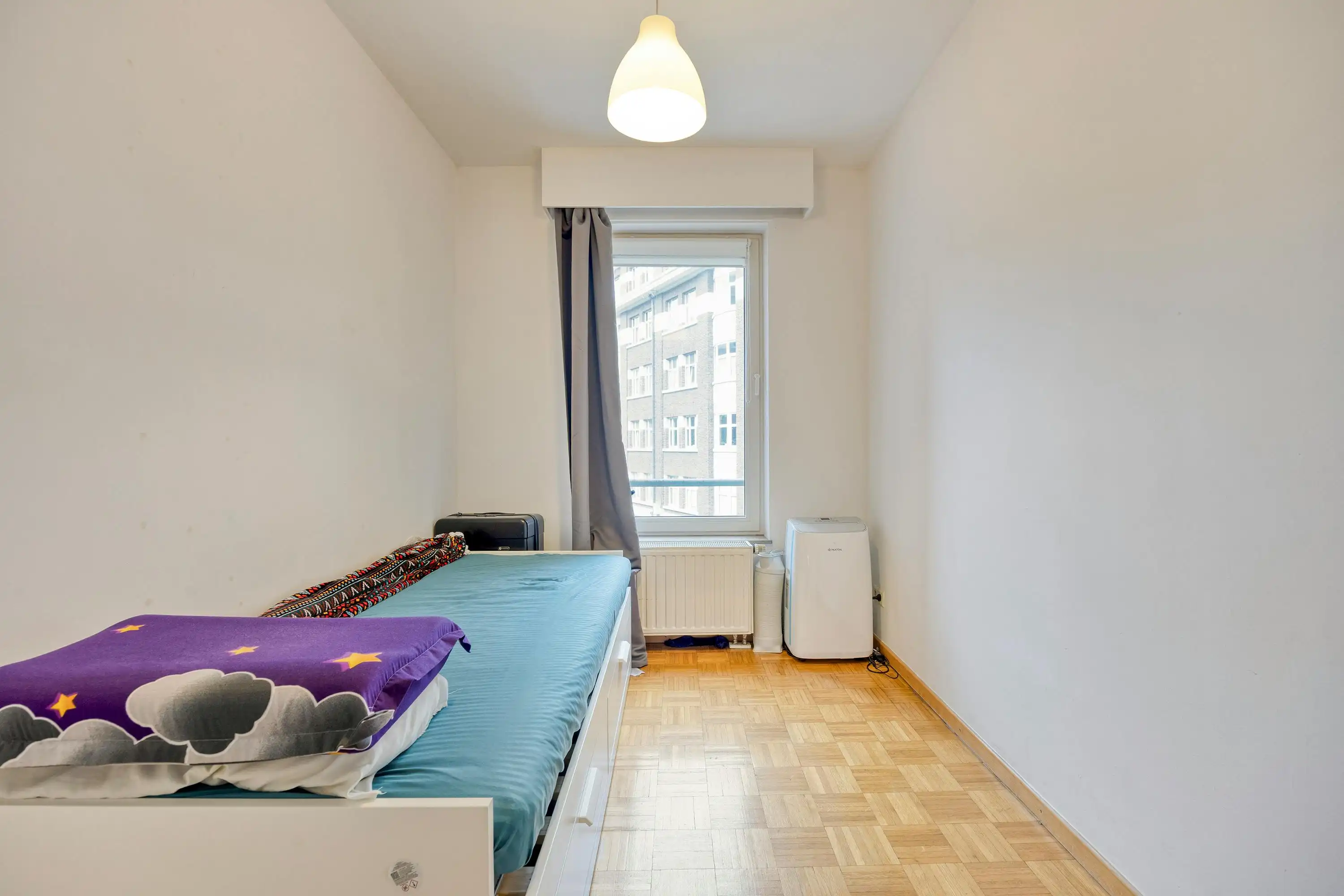 Appartement met twee slaapkamers en balkon gelegen in Elsene. foto 17