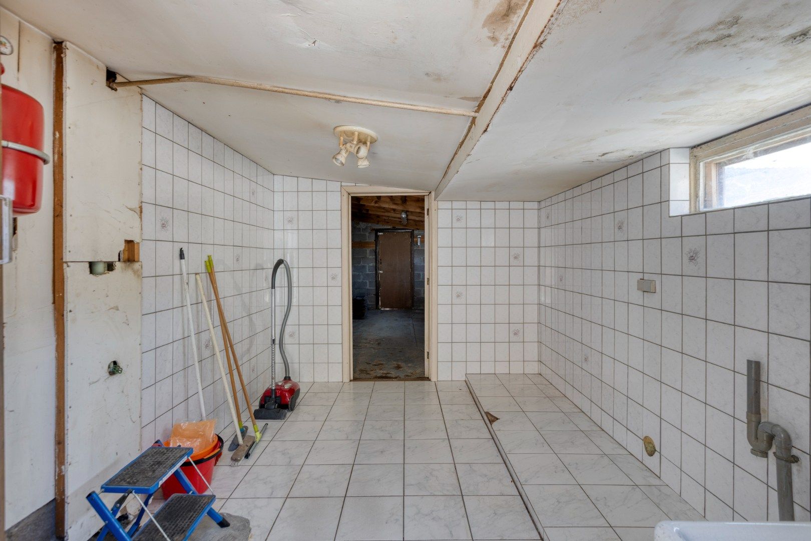 Gezellig ingerichte woning met hobbyruimte en tuin + toegang achterom foto 24