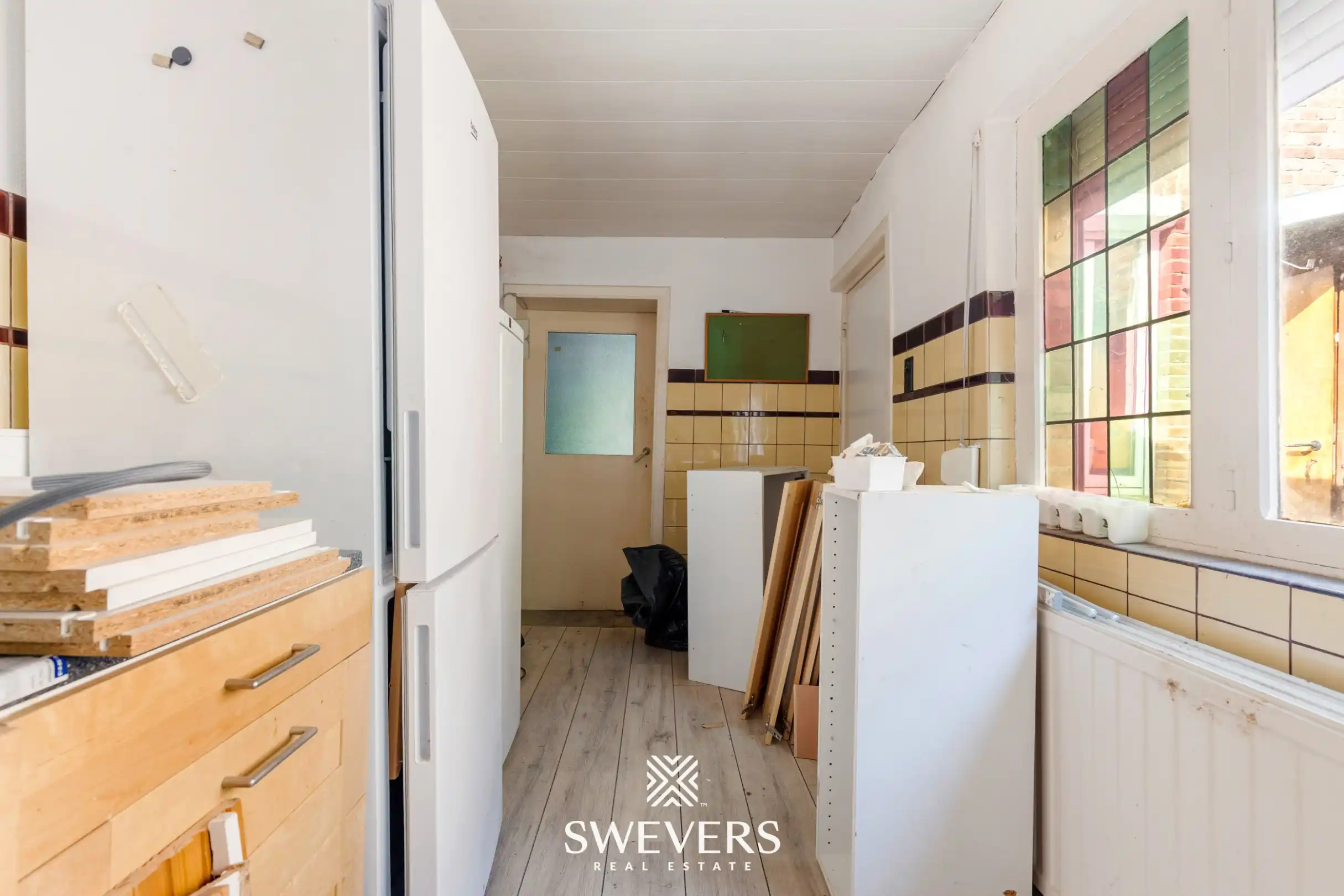 Uitstekend gelegen te renoveren woning met 3 slaapkamers foto 7