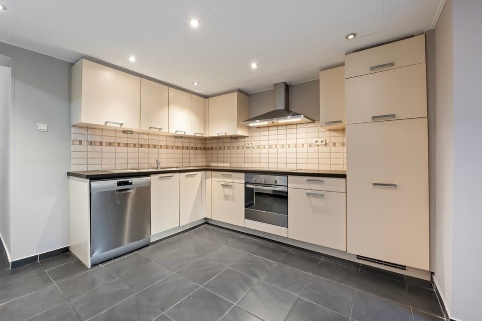 RUIME, INSTAPKLARE WONING MET 4 SLAAPKAMERS EN EEN ZONNIGE TUIN TE HEERS foto 10