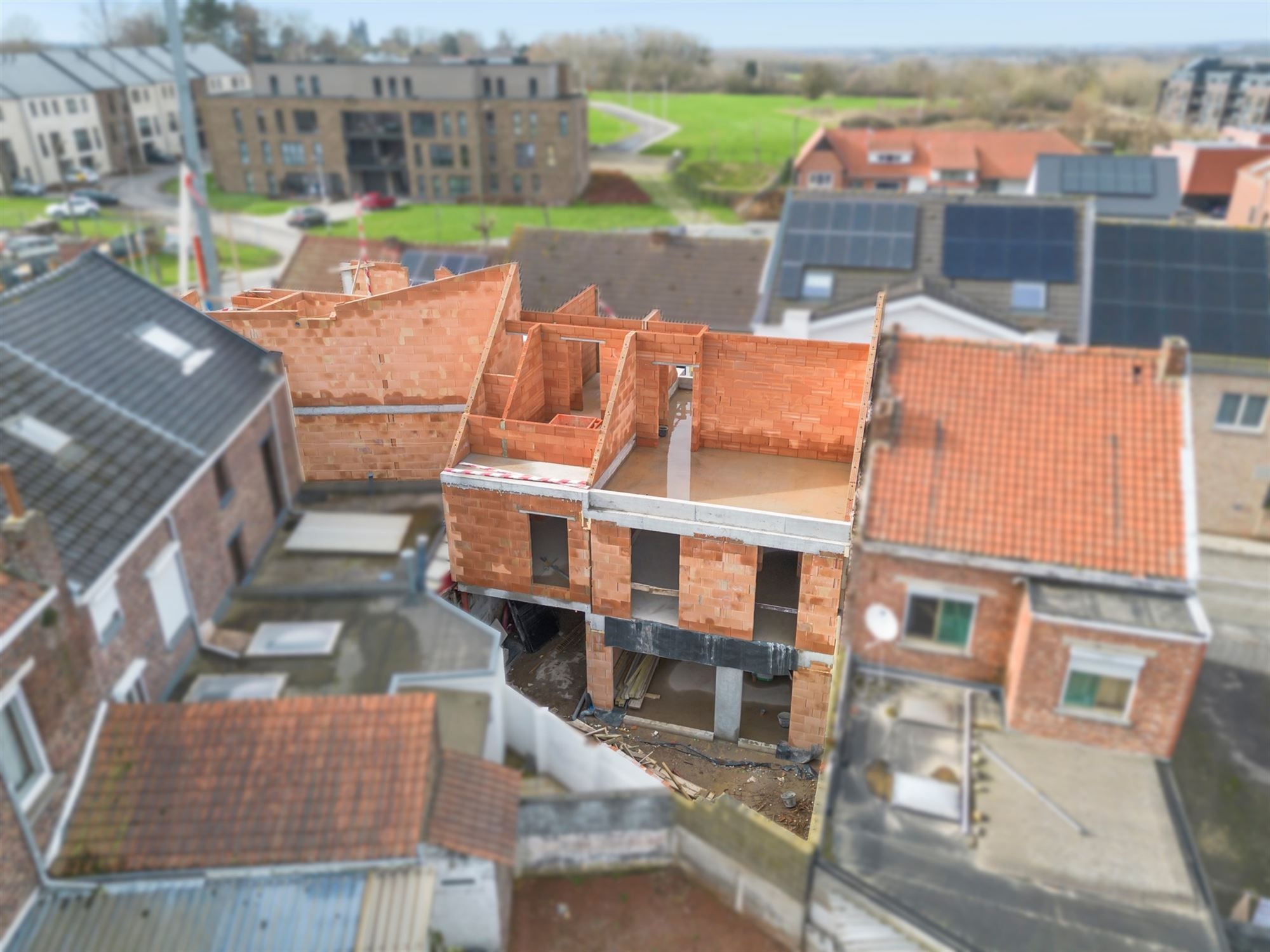 KNAPPE NIEUWBOUWWONING IN HET CENTRUM VAN BORGLOON (MOGELIJKHEID AANKOOP 6% BTW) foto 10