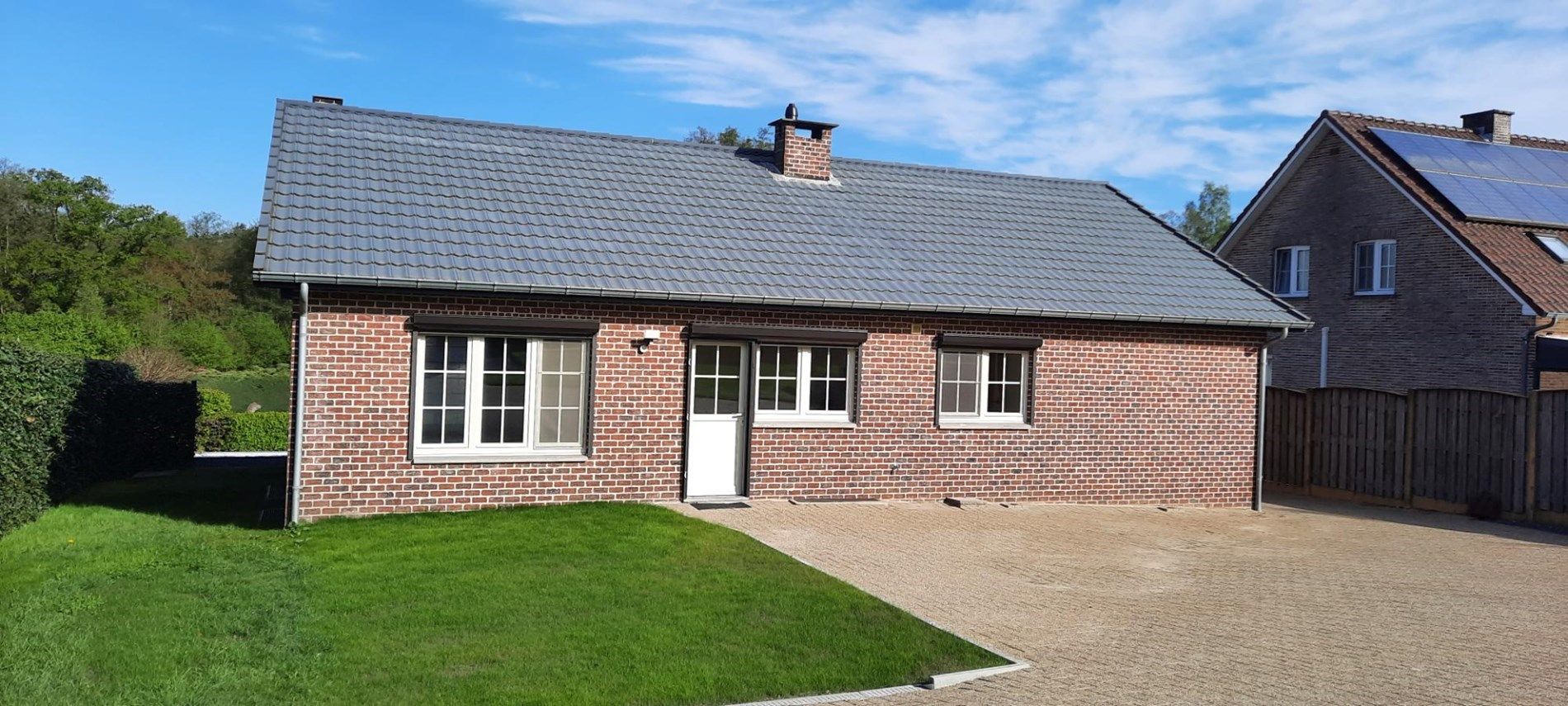 Gelijkvloerse gezinswoning met 3 slaapkamers, fraaie tuin en carport in Opoeteren. foto 13