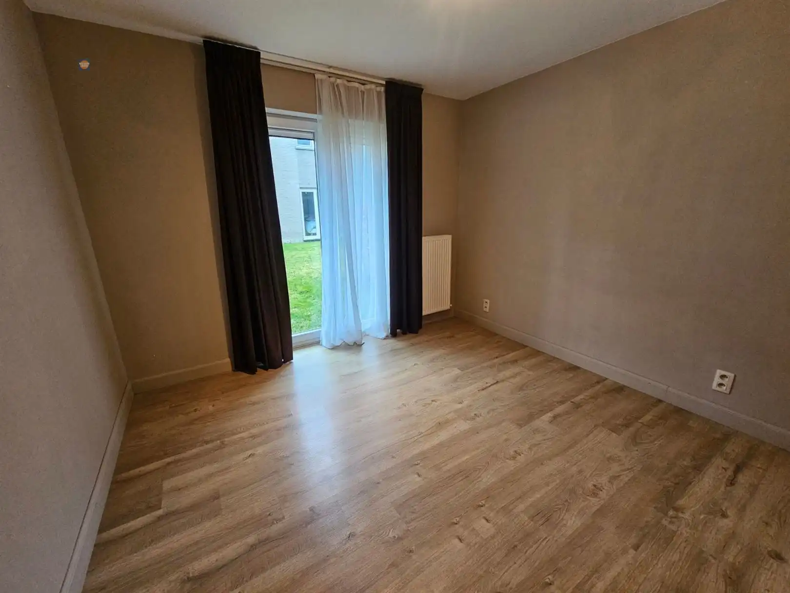 Gelijkvloers 2-slaapkamerappartement, terras en staanplaats foto 3