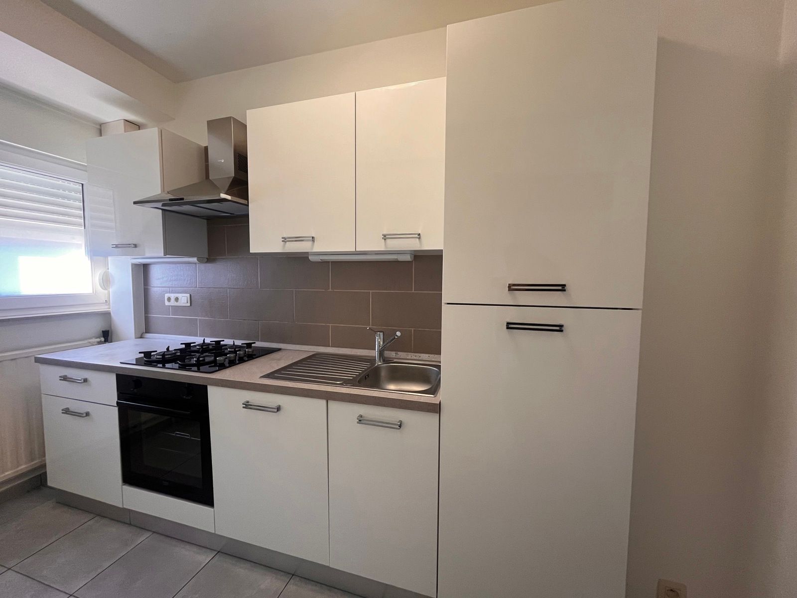 Gelijklvloers app met 2 slpks - garage en gemeenschap tuin foto 5