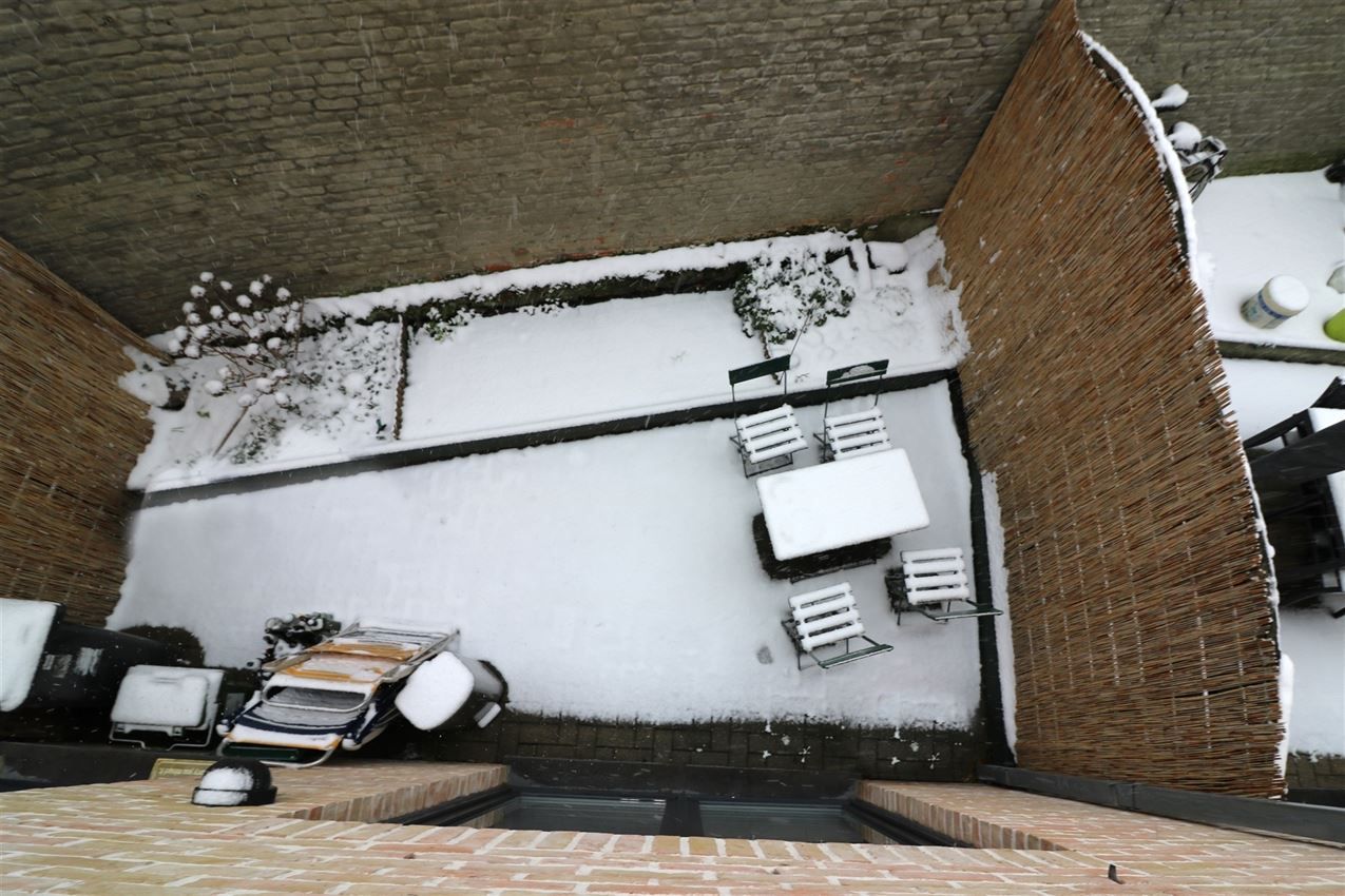 Centrale, zeer gezellige stadswoning met 2 slpk. en koer foto 2