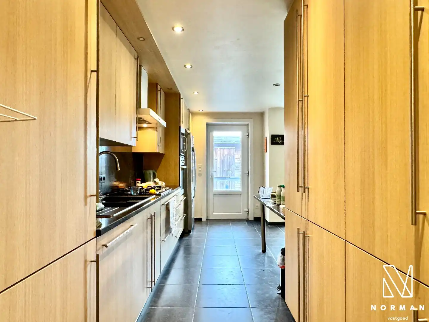 Instapklare woning met 2 slaapkamers, tuin en garage te huur in rustige woonwijk te Hulste! foto 13