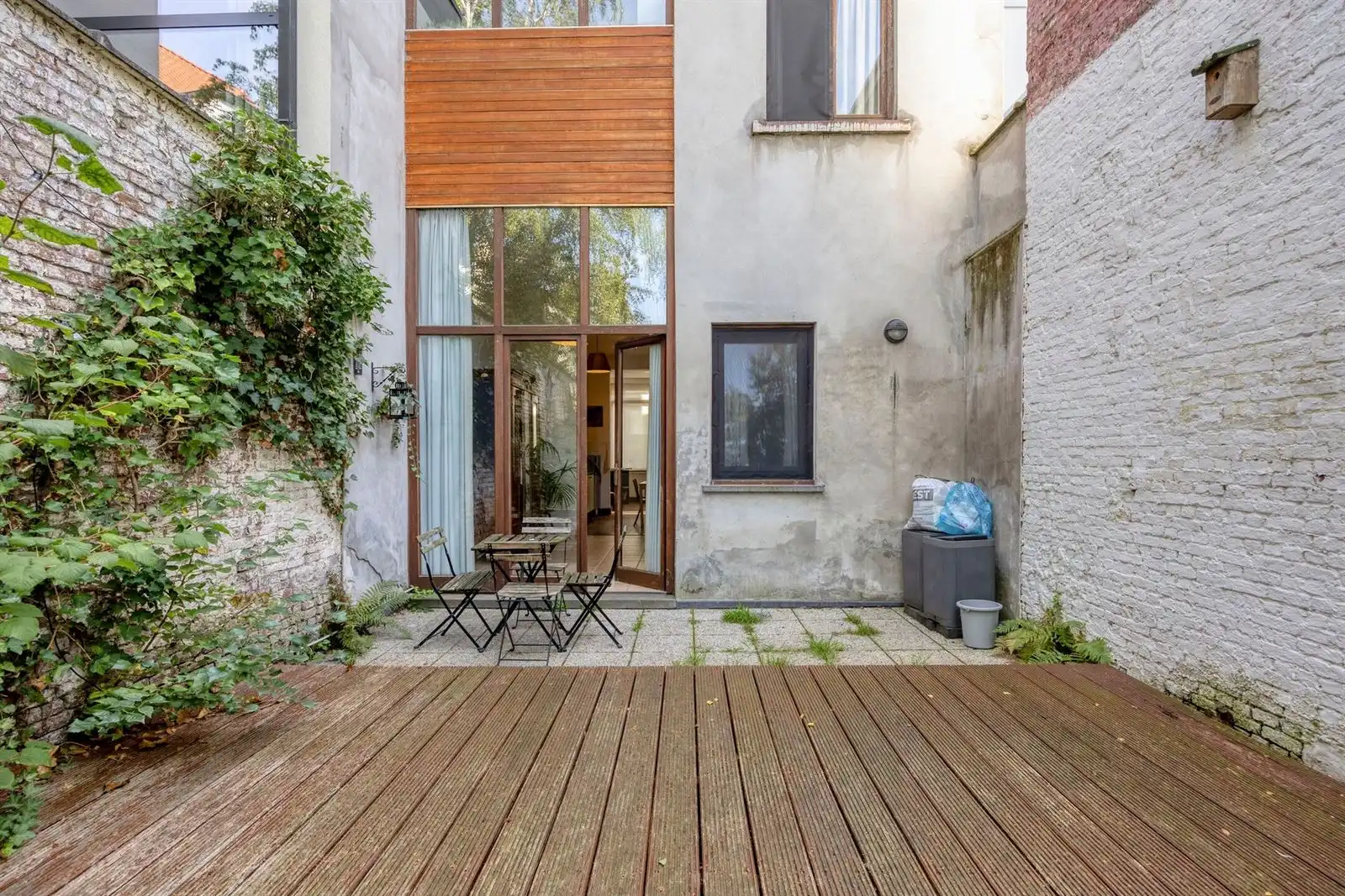 Instapklaar 1-slpk appartement met tuin foto 13