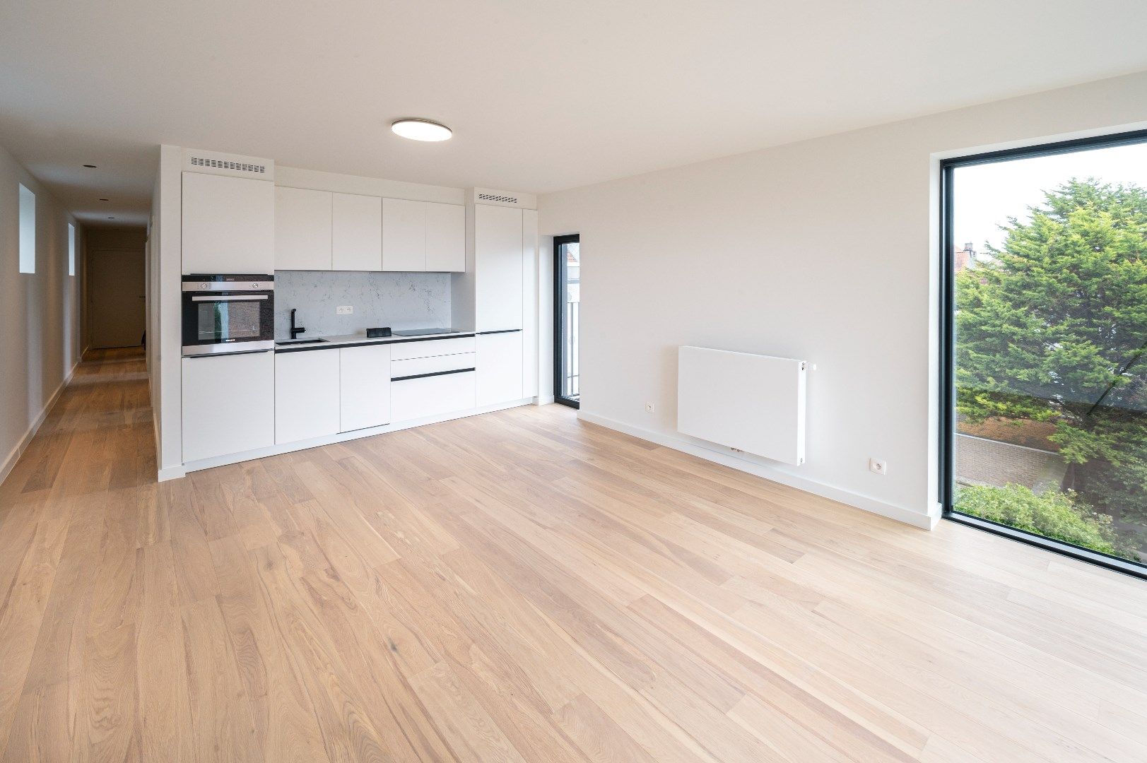 Vernieuwbouw – Luxueus appartement in een standingvol gebouw met glorieuze gevel op een boogscheut van het strand te Mariakerke! foto 5