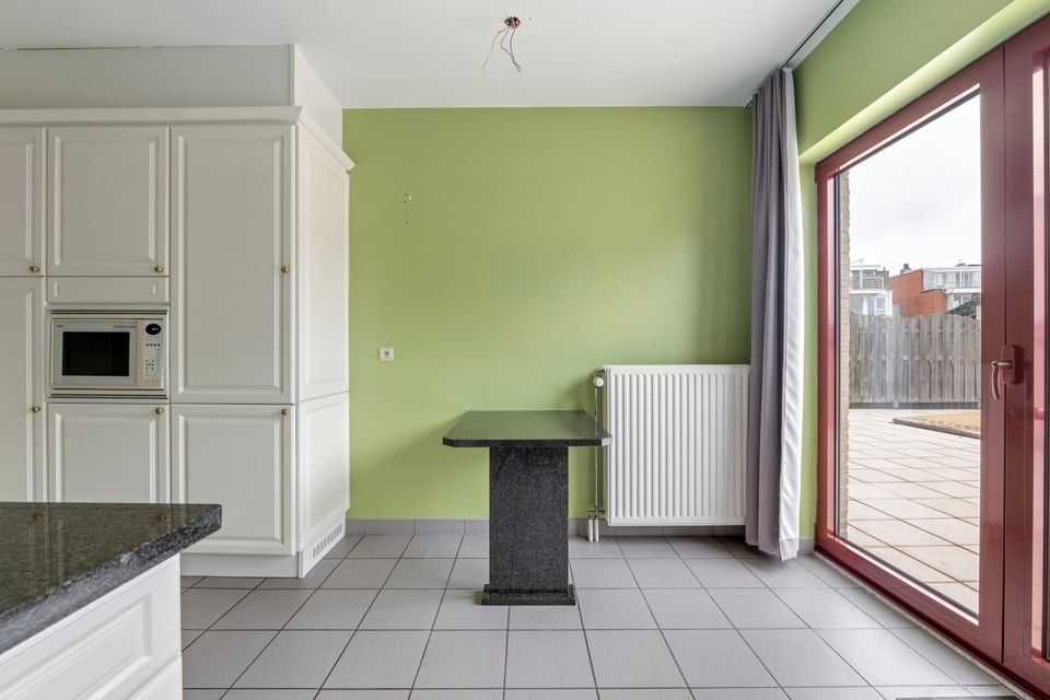 RUIM APPARTEMENT MET UITZONDERLIJK TERRAS VAN +50M² IN SINT-TRUIDEN foto 20