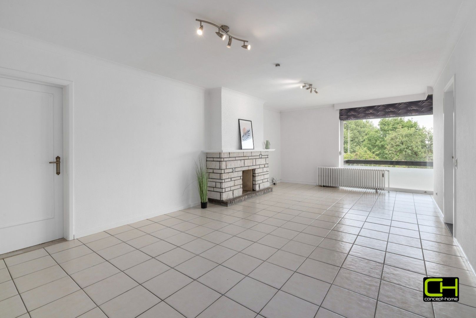 Appartement met twee slaapkamers en garage te koop in Waarschoot foto {{pictureIndex}}