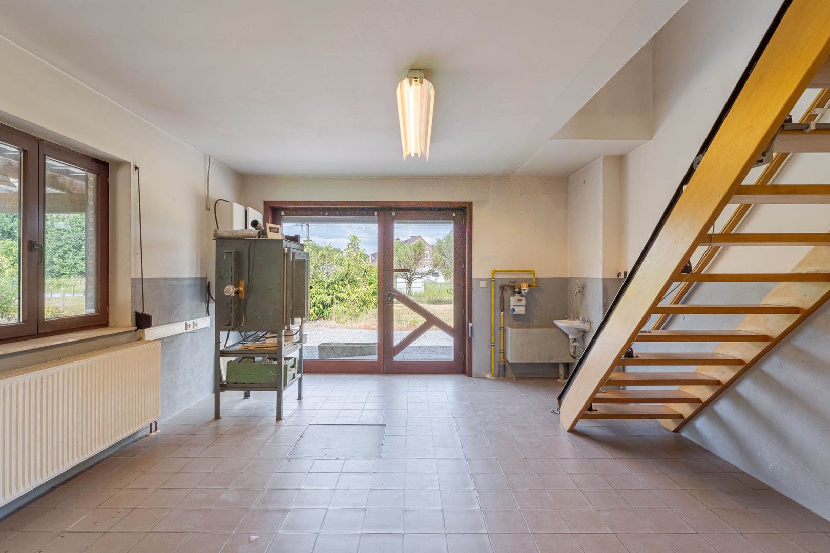 Te renoveren open bebouwing op ruim perceel in Zonhoven (1396 m²) foto 8