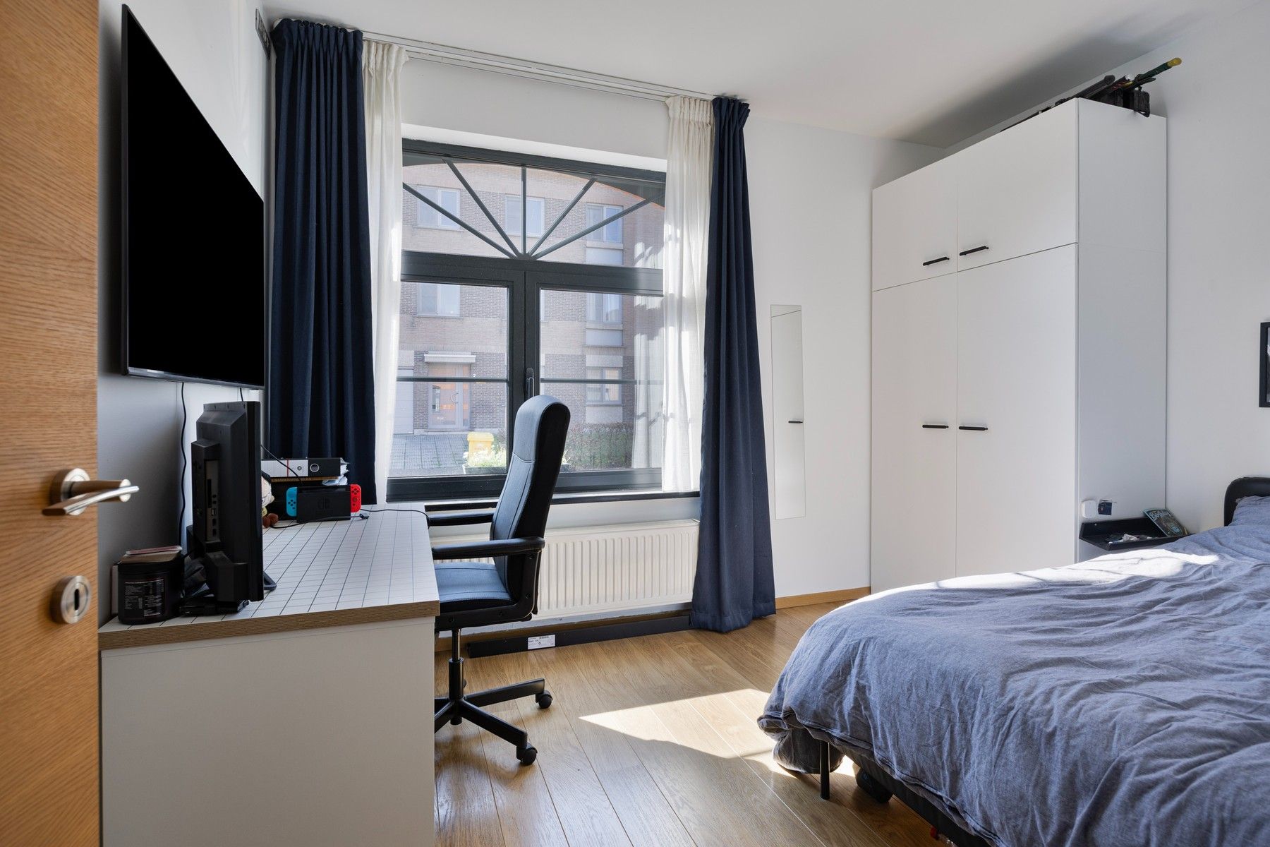 Gelijkvloersappartement met terras en kleine tuin foto 14