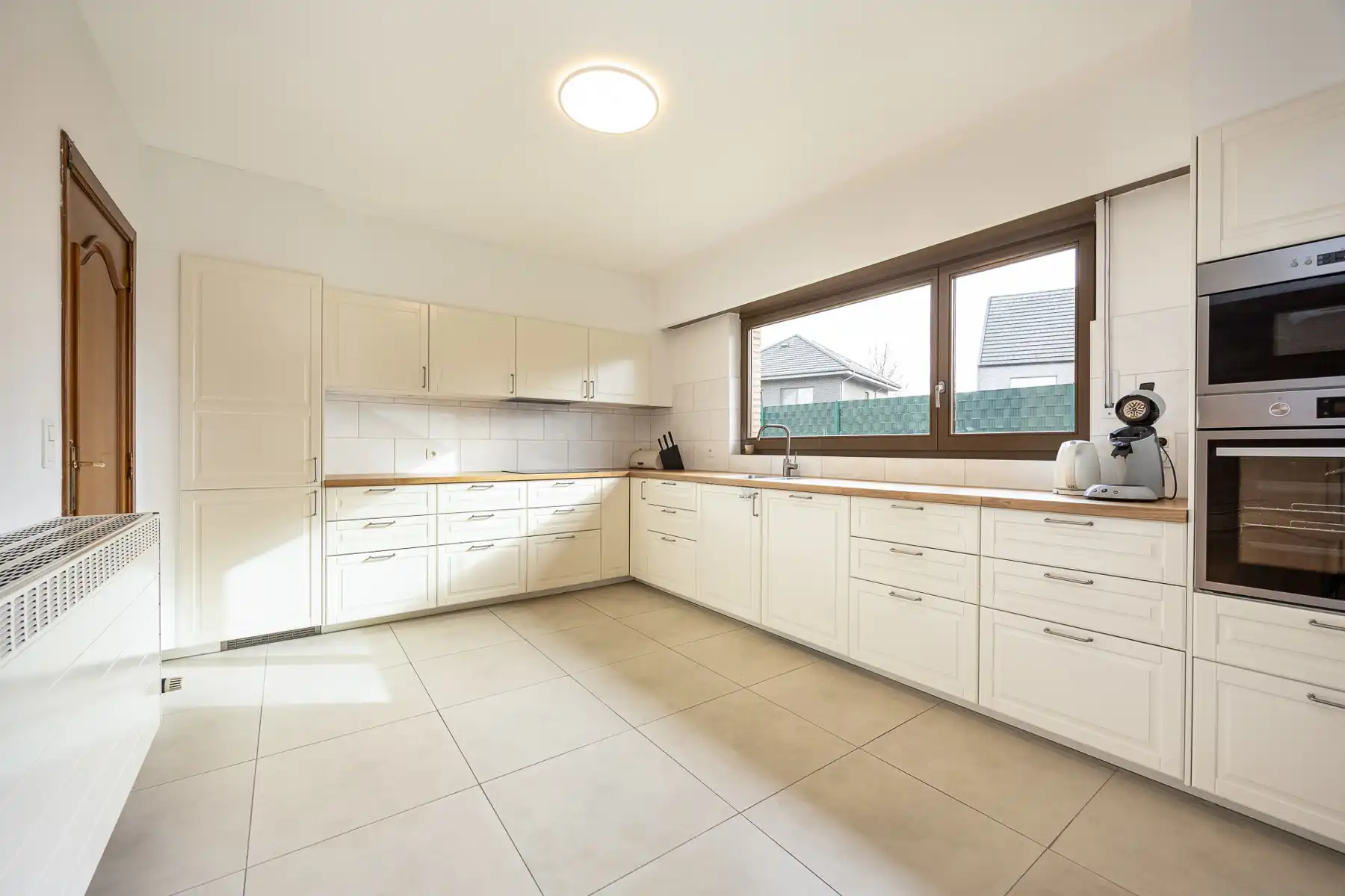 Verrassend ruime woning met 6 slaapkamers en 2 badkamers foto 8