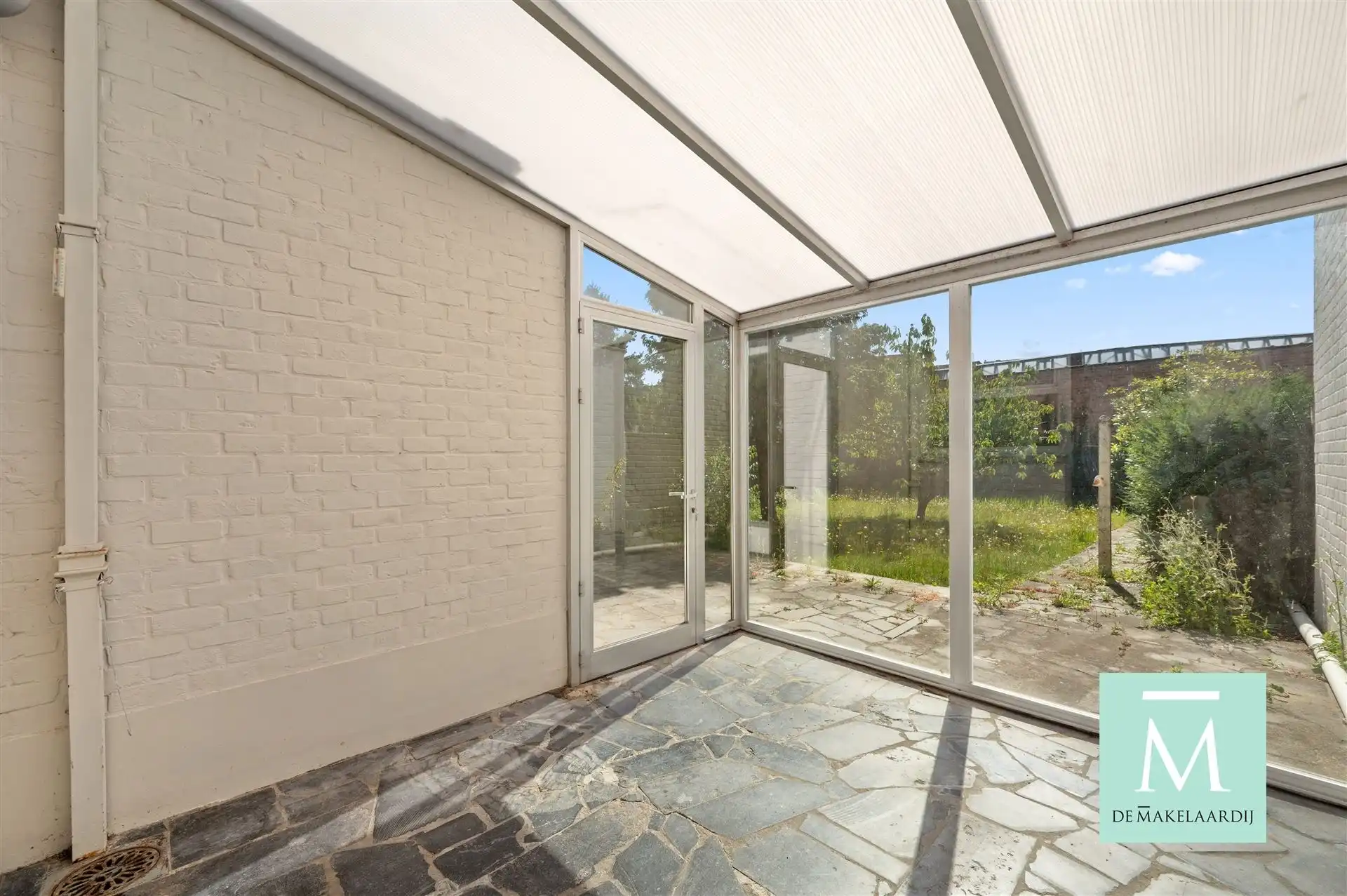 Ruime woning met 3 slaapkamers, aangename tuin en inpandige garage foto 13