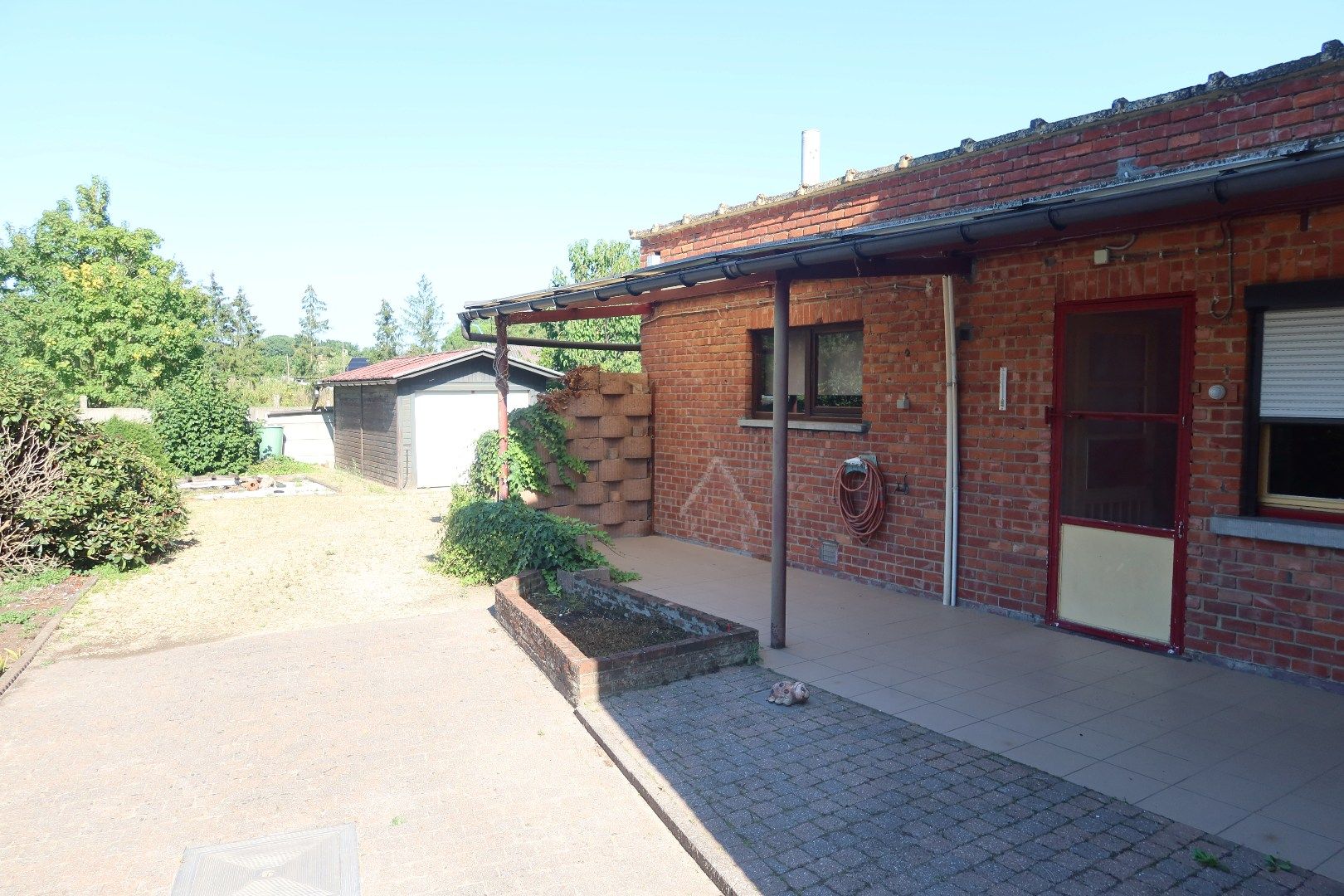 Op te frissen woning met 3 slk en tuin foto 23