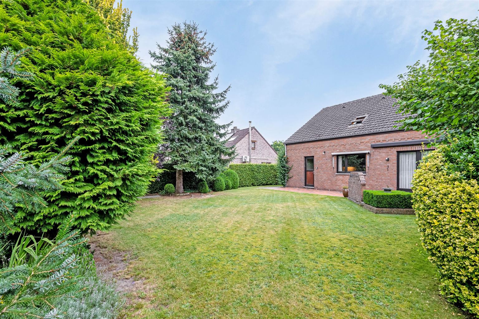 Charmante woning met 4 slaapkamers, prachtige tuin en inpandige garage, gelegen op een perceel van 8a4ca in het hart van Gruitrode. foto 31