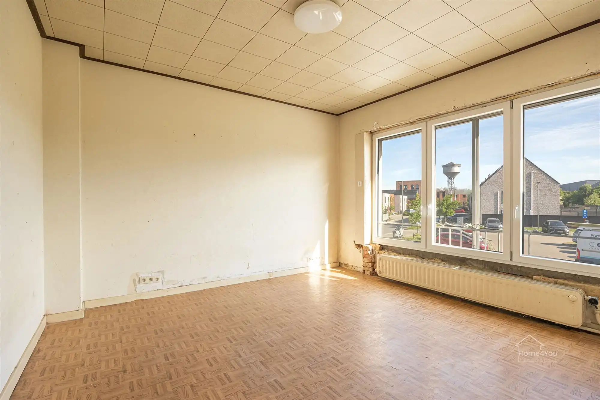 Op te frissen woning met zéér ruime extra zolder foto 11