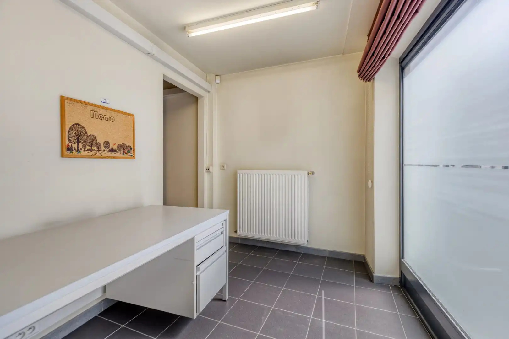 Strategisch gelegen commerciële ruimte van ca. 201 m² in het centrum van Beringen !  foto 21