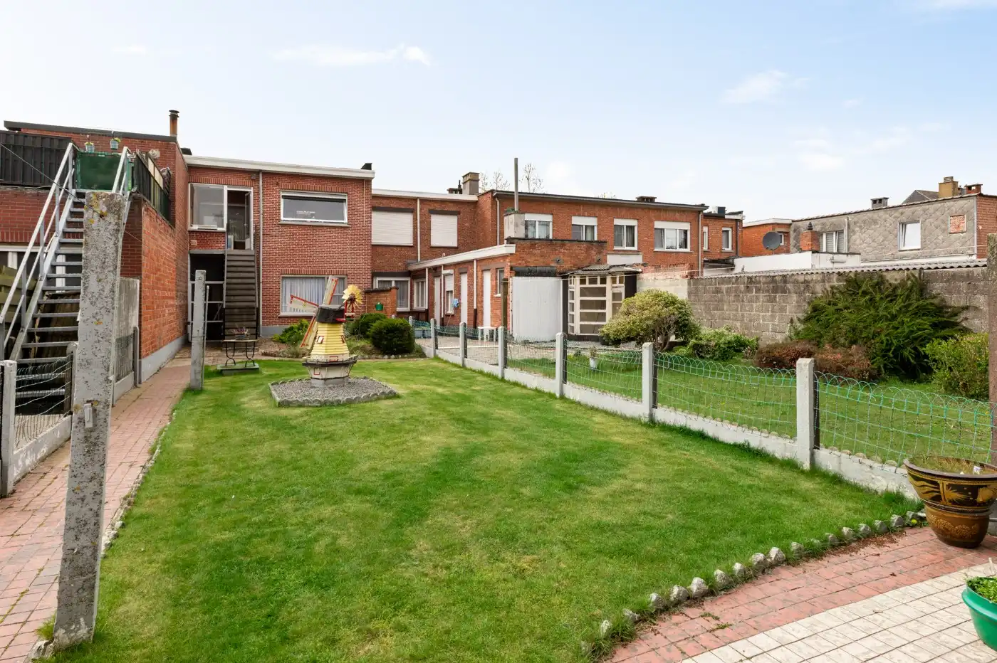 Te renoveren woning met 2 slpk., dubbele garage en tuin foto 24